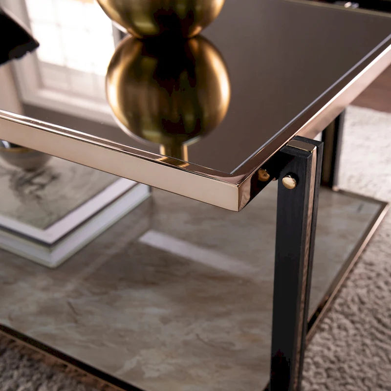 Table basse en métal couleur champagne avec plateau miroir fumé